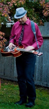 Aaron promo red shrt looking down